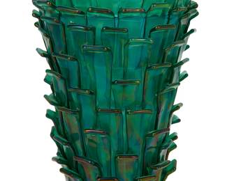 99
Fulvio Bianconi (1915-1996)
A "Ritagli" iridescent glass vase for Venini, 1992; Venice, Italy
Acid etched to underside: Venini / Fulvio Bianconi / 1992/197; with sticker to side: Venini Murano / Made in Italy
With layered emerald iridescent glass applied to blue vase
13.125" H x 8.625" Dia.
Estimate: $2,000 - $3,000