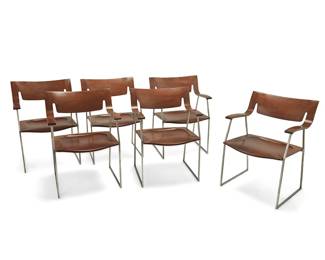 13
Late 20th/early 21st century
A Set Of Conde House Armchairs
Each marked to underside: Conde House / 161018 / Made in Japan; further marked on sticker: Advance International Inc.
The Japanese wood chairs with brushed metal frame, featuring curved arm rests and sculptural seat back above a seat with formed impression, sold with two sets of upholstered seat cushions that form to seat impression, 6 pieces
Each: 31.25" H x 22.75" W x 22" D
Estimate: $1,200 - $1,800