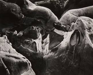 255
Edward Weston
1886-1958
"Rock Erosion, Point Lobos," 1938
Gelatin silver print on paper mounted to a board mount
Initialed and dated in pencil on the mount, at right: EW; dated again and with a notation in pencil on the mount, verso: PL-R-21g
Image/Sheet: 7.625" H x 9.625" W; Mount: 14.875" H x 15.625" W
Estimate: $4,000 - $5,000