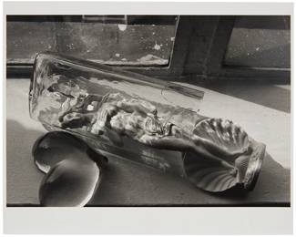 269
Andre Kertesz
1894-1985
"Botticelli Sculpture In Glass On Windowsill," 1978
Gelatin silver print on paper
From the edition of unknown size; printed later
Unsigned; dated in pencil at the lower edge, verso; titled on a gallery label affixed to the frame's backing board
Image: 6.625" H x 9.75" W; Sheet: 8" H x 10" W
Estimate: $1,500 - $2,000