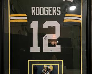 Signed & Framed with COA. Aaron Rodger’s jersey. 