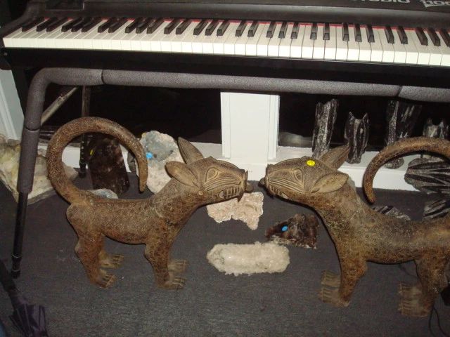Pair of Benin Bronze Leopards below keyboard ,,, and assorted fossils & mineral specimens