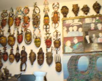25 Guro masks ,-Ivory Coast , W.Africa  on left ...............'''..4 tibetan mask top right !