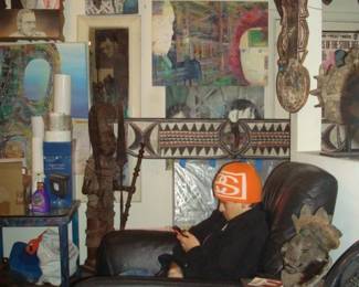 Leather chairs $80 ea. the horizontal red ,white and black mask is  Bobo from Burkina Faso