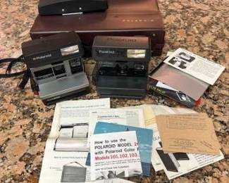 #9005 • 2 Vintage Polaroids, Case and Manuals