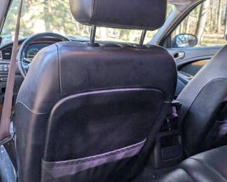 REAR VIEW OF BACK DRIVER'S SEAT