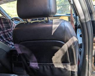 BACK OF FRONT PASSENGER SEAT