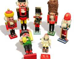 7 Vintage Nutcrackers Figurines - Skier is nutcracker village, 6 are unmarked
