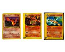 Complete Charmander Evolution Including 1999 WoTC Team Rocket Charmander #50, Pokemon Expedition Charmeleon #73, and Pokemon Expedition Charizard #40 All In Lightly Played Condition

