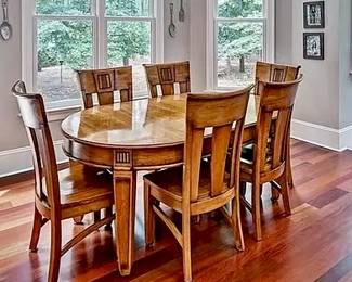 oval table with 6 chairs. Table measures 71” long x 47” wide. Currently there are two leafs in. Each leaf measures 13.5” inches