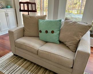 Pair of matching loveseats from Havertys. Measures 5’ wide, 37” deep