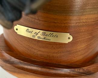 Bronze sculpture “Out of Bullets” by D. DeMoss