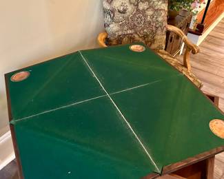 (open) felt surface of the game table