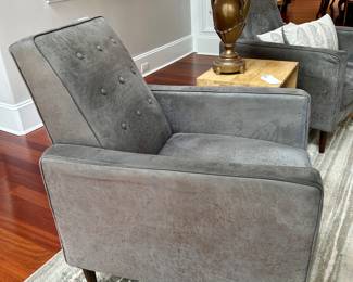 Pair of matching gray recliners