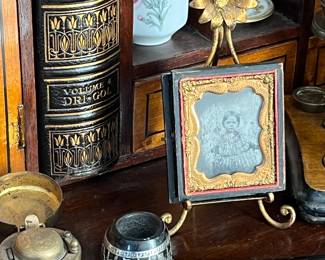daguerreotype, inkwells and a sterling pipe 