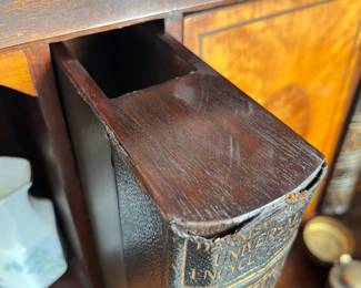 Hidden book drawers inside the secretary 