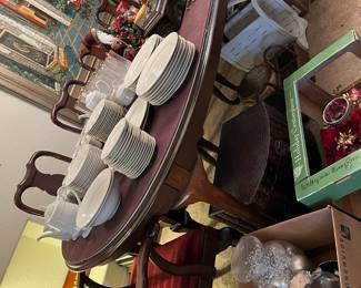 Ethan Allen dining set with two leaves, pads to cover all, six side chairs and two arm chairs