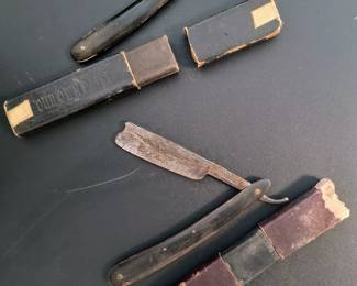 Early straight razors with boxes
