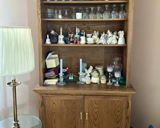 Hutch with pull down front 

Precious moments and crystal pieces 