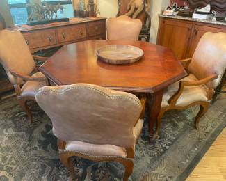 table -2 heavy leaves and 4 leather chairs  on this distressed set -super comfy too 
