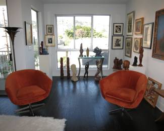 Sleek pair of MCM Pedestal Swivel Club Chairs from DWR - no longer available.