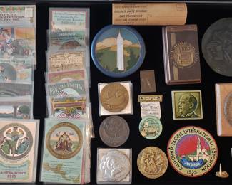 Collection of 1930's Pan American Exposition Memorabilia including a Panorama of the Golden Gate Bridge in its Original Mailer; Postcards, Bronze Medals, etc.