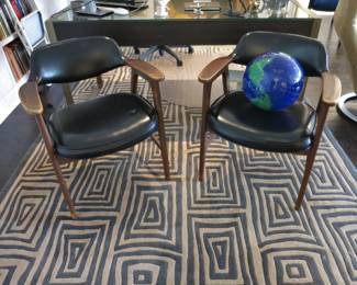 Pair of Mid-Century Walnut Armchairs on a Textured Wool Rug