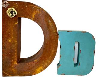 Two metal letter D decorative letters.