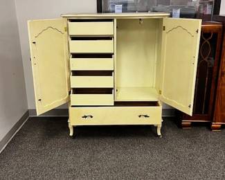 $75 USD      Antique Yellow Wood Wardrobe Cabinet WDI224-16     Transform your bedroom into a charming and cozy space with this Antique Yellow Wardrobe. Its unique design and vibrant color will add a touch of elegance to your room. Keep your clothes organized and easily accessible while adding a vintage flair to your décor. Great piece to reimagine with a little paint!

 Dimensions: 39 x 17 x 49H in

Condition: Used and in good condition. Minor signs of wear commensurate of use and age. 

Location: Local pick up Portland, OR 97224.  Shipper suggestions available upon request.      https://goodbyhello.com/products/copy-of-mid-century-style-4-piece-entertainment-center-bookcase-wdi224-15?_pos=3&_sid=f1836dac0&_ss=r