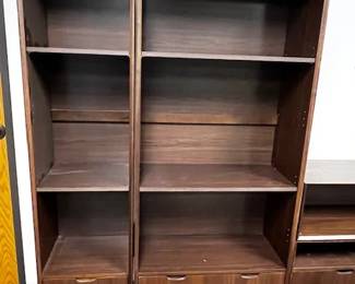 $175 USD      Mid Century Style 4 piece Entertainment Center/Bookcase WDI224-15    Transform your living space with our Mid Century Style 4 piece Entertainment Center/Bookcase! This versatile and stylish piece combines functionality with modern design, perfect for organizing your entertainment center or displaying your favorite books. Elevate your home decor with this must-have addition. The piece can be disassembled into 4 parts.

Dimensions: 97 x 14.5 x 72.5H in

Condition: Used and in good condition. Minor signs of wear commensurate of use and age. 

Location: Local pick up Portland, OR 97224.  Shipper suggestions available upon request.      https://goodbyhello.com/products/copy-of-set-of-2-pier-1-imports-rattan-side-chair-wdi224-14?_pos=26&_sid=f1836dac0&_ss=r