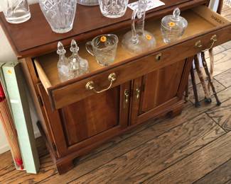 Small cabinet, cut glass vases and decanters