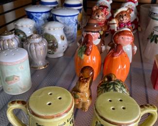 large collection of salt and pepper shakers