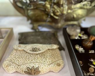 Vintage Purses you will love.  We have a ton of them.