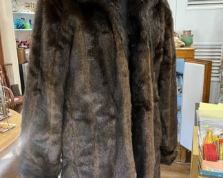 Faux and fab.  Love this coat.  Size large.  Beautiful condition.