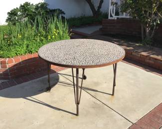 Cement and Rock Table on wheels $100. Extremely heavy.