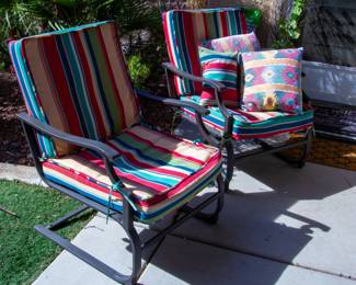 Outdoor chairs with colorful cushions