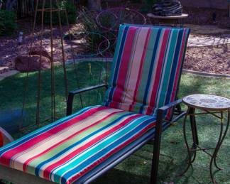 Lounger with colorful cushion