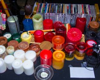 Assortment candles and CDs