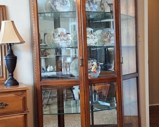 Lighted oak china cabinet