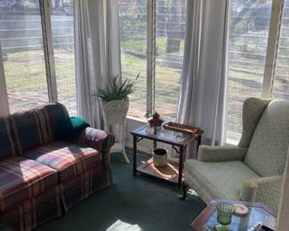 The den has some beautiful, white long window coverings for sale.