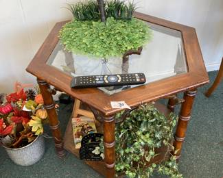 Octagonal occasional table with a glass top