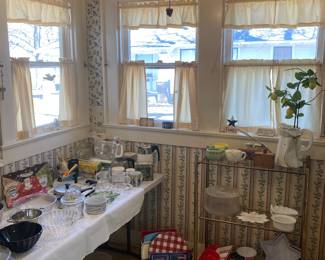 Kitchen window treatments are also for sale.