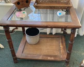 Another occasional table with a glass top