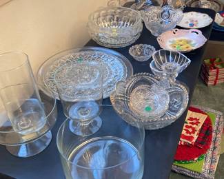 Lots of beautiful glass serving dishes