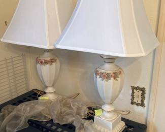 Two porcey lamps, which are very old and in great shape