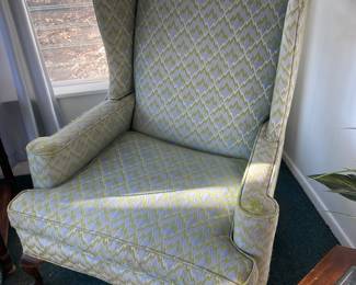 There is a wingback chair in the den in great shape