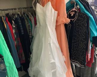 There is a lovely white gown for sale too