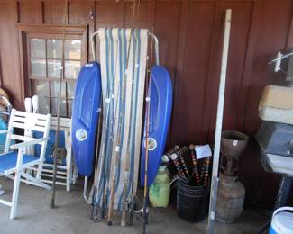 Pool float,croquet set, fishing poles 