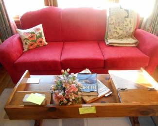 Wonderful red sofa custom-made coffee table and quilt