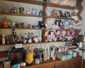 Collection of figurines and handmade dolls